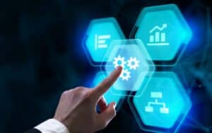 a hand selects and moves elements on a digital screen